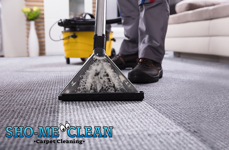 Sho-Me Carpet Cleaning - Person Cleaning Carpet With heavy duty equipment - Branson, MO