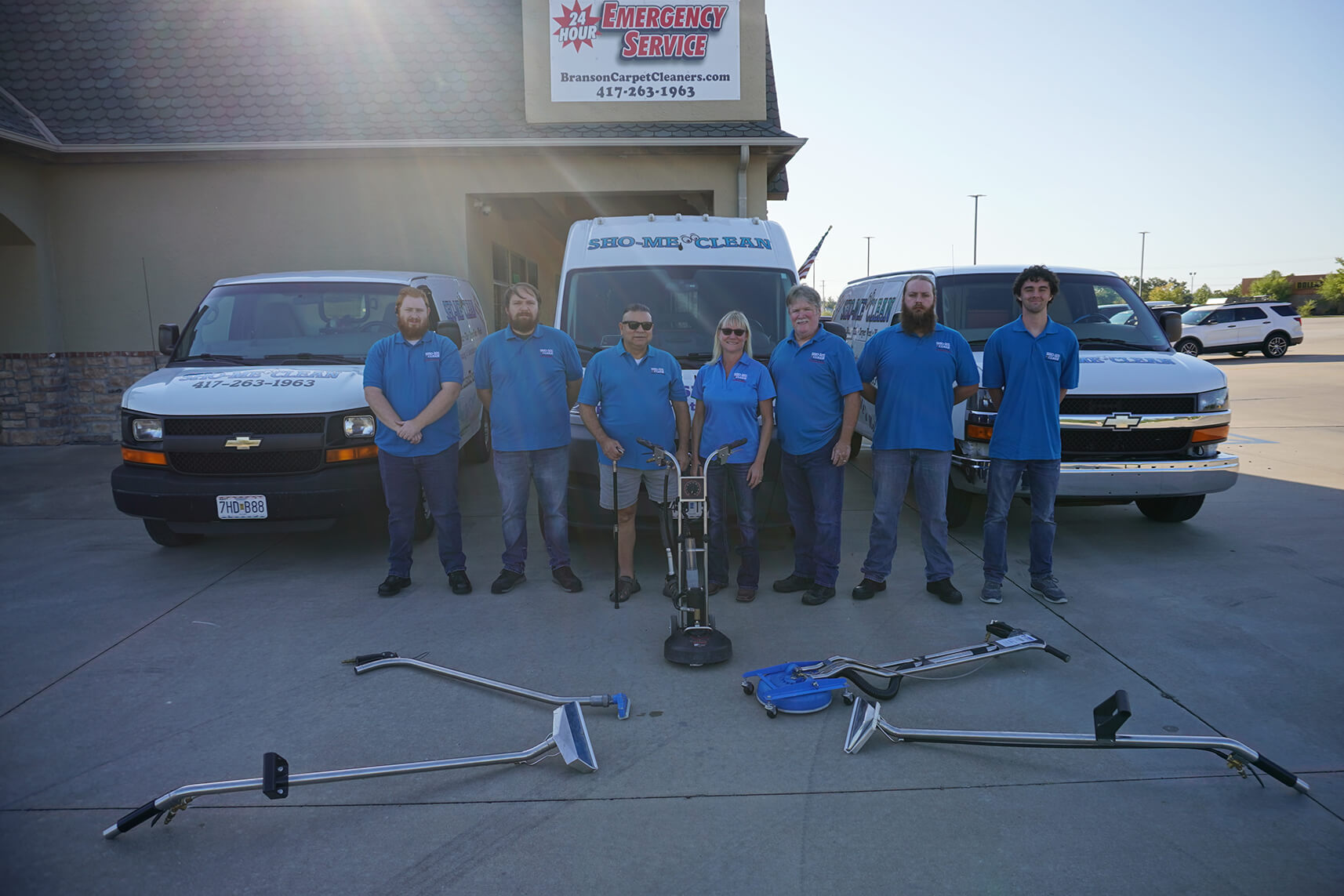 Sho-Me Clean Carpet Cleaning, team lined up with equipment in front of company vans - Branson, MO